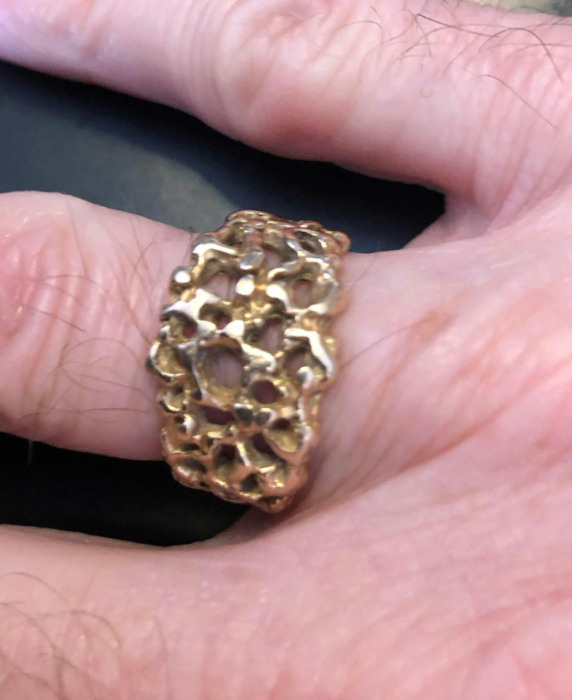 A golden ring on a finger